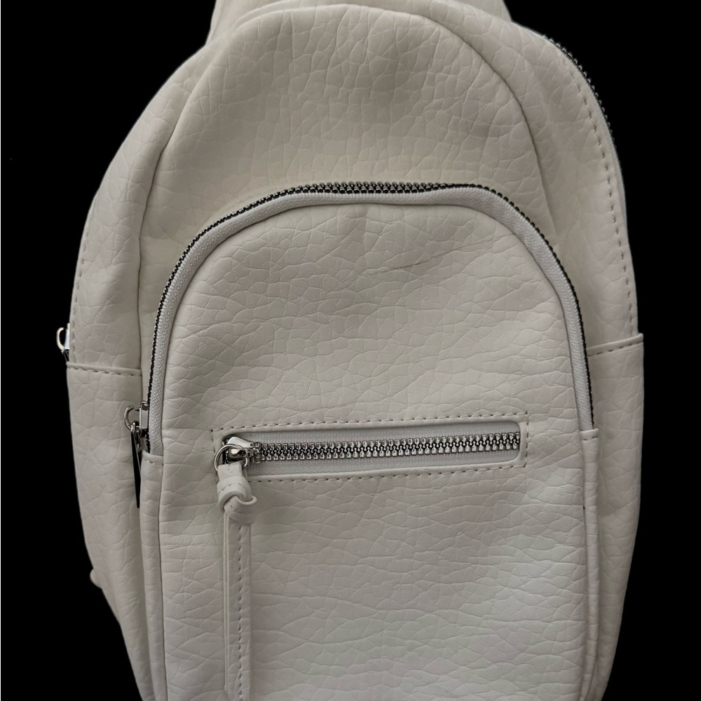 White side backpack. Very soft leather.